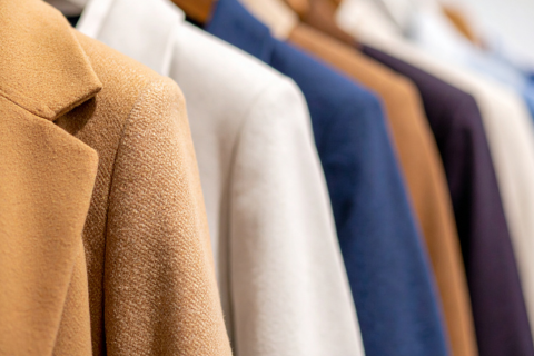 Suit jackets hanging in a closet