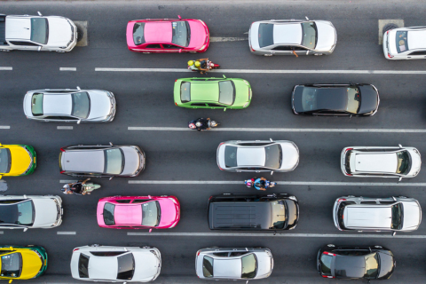 Cars in traffic on a multi-lane road