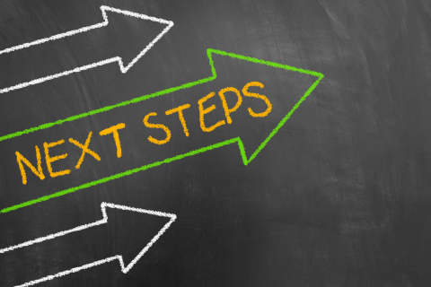 A black background with three arrows pointing upward to the right and the words "Next Steps"