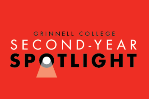 The title of the event against a red background with a yellow spotlight